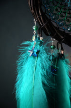 Load image into Gallery viewer, Handmade Turquoise Dreamcatcher with Crystal Center and Teal Feathers Boho Decor