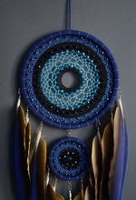 Load image into Gallery viewer, Large blue dream catcher with blue-yellow macaw feathers