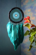 Load image into Gallery viewer, Handmade Turquoise Dreamcatcher with Crystal Center and Teal Feathers Boho Decor
