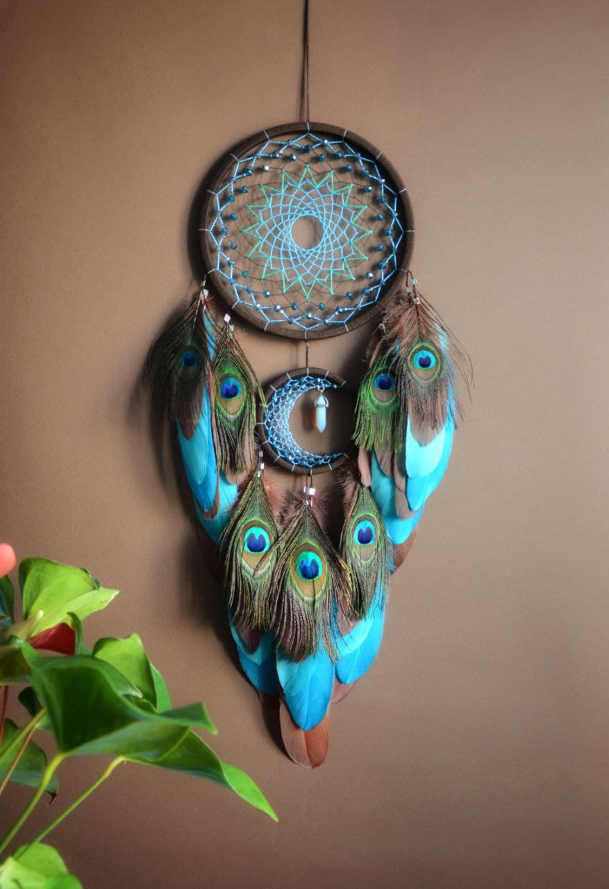 Dreamcatcher with peacock feathers