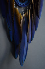 Load image into Gallery viewer, Large blue dream catcher with blue-yellow macaw feathers
