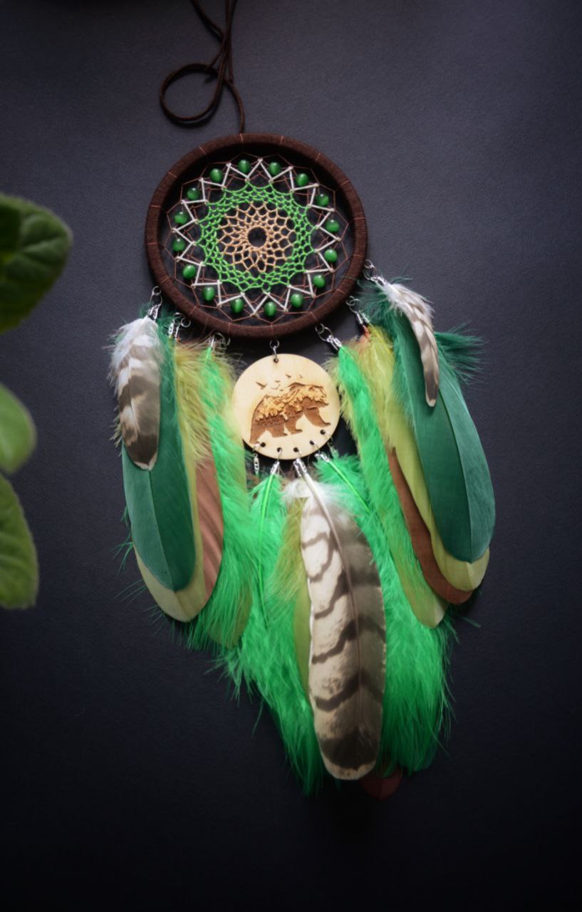 brown green dream catcher with bear totem animal