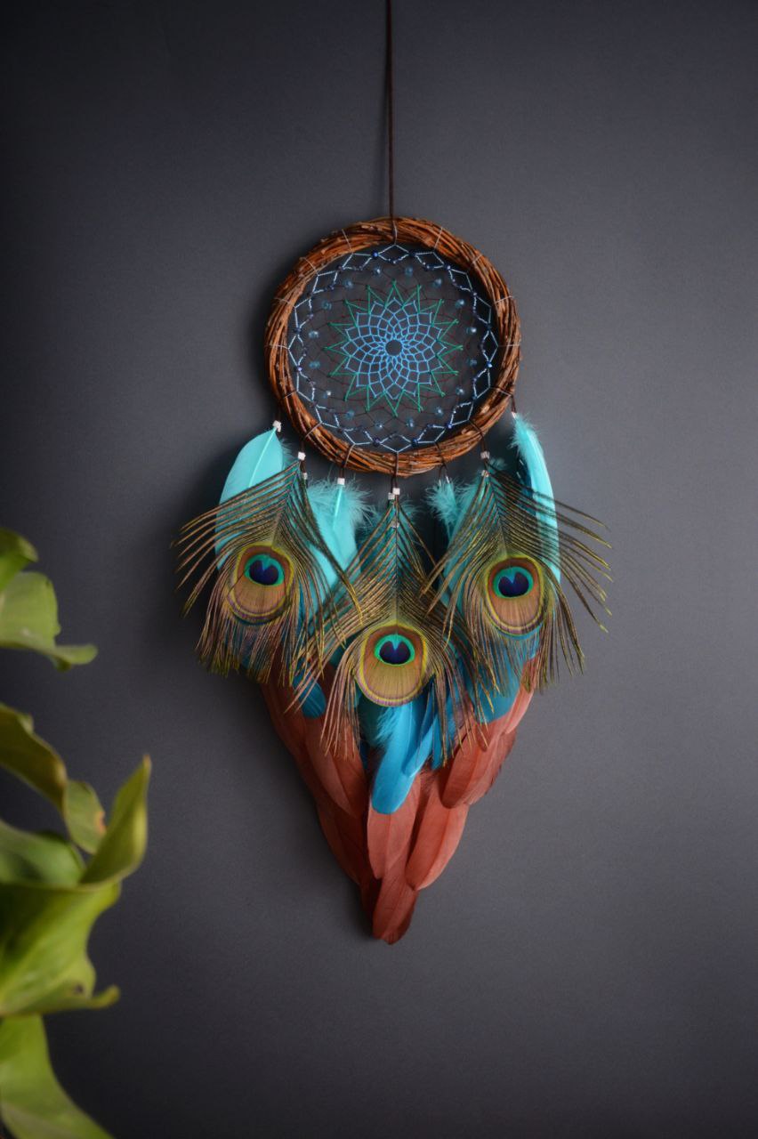 dream catcher with peacock feathers