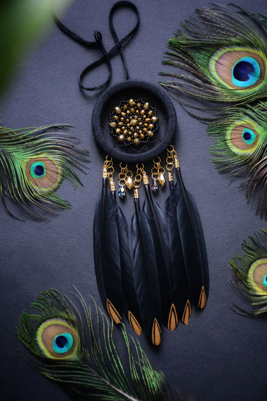 small black dream catcher with golden glass beads